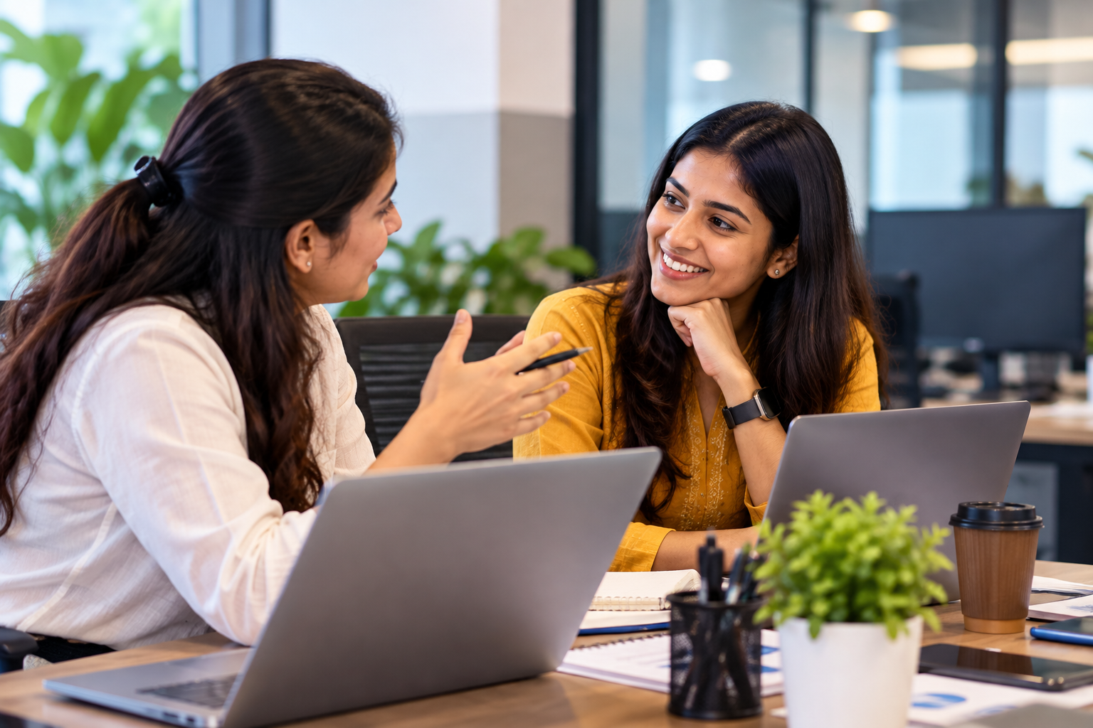 Indian women discussing digital agency strategy